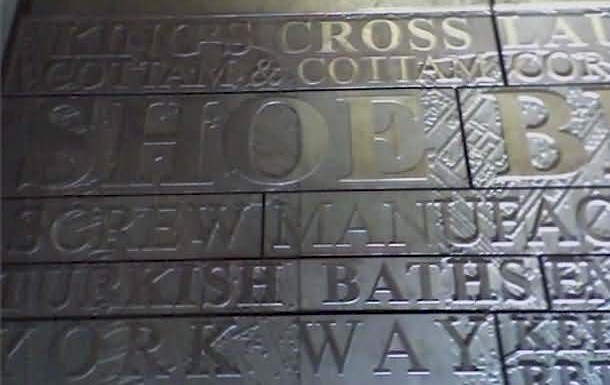 Wall plaque at 9 Caledonian Road