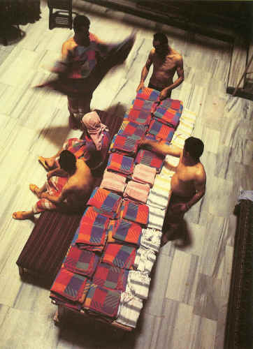 Towels at the ready at the Cemberlitas baths, Istanbul, 1990s