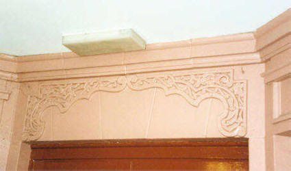 Lintel over doorway into the street